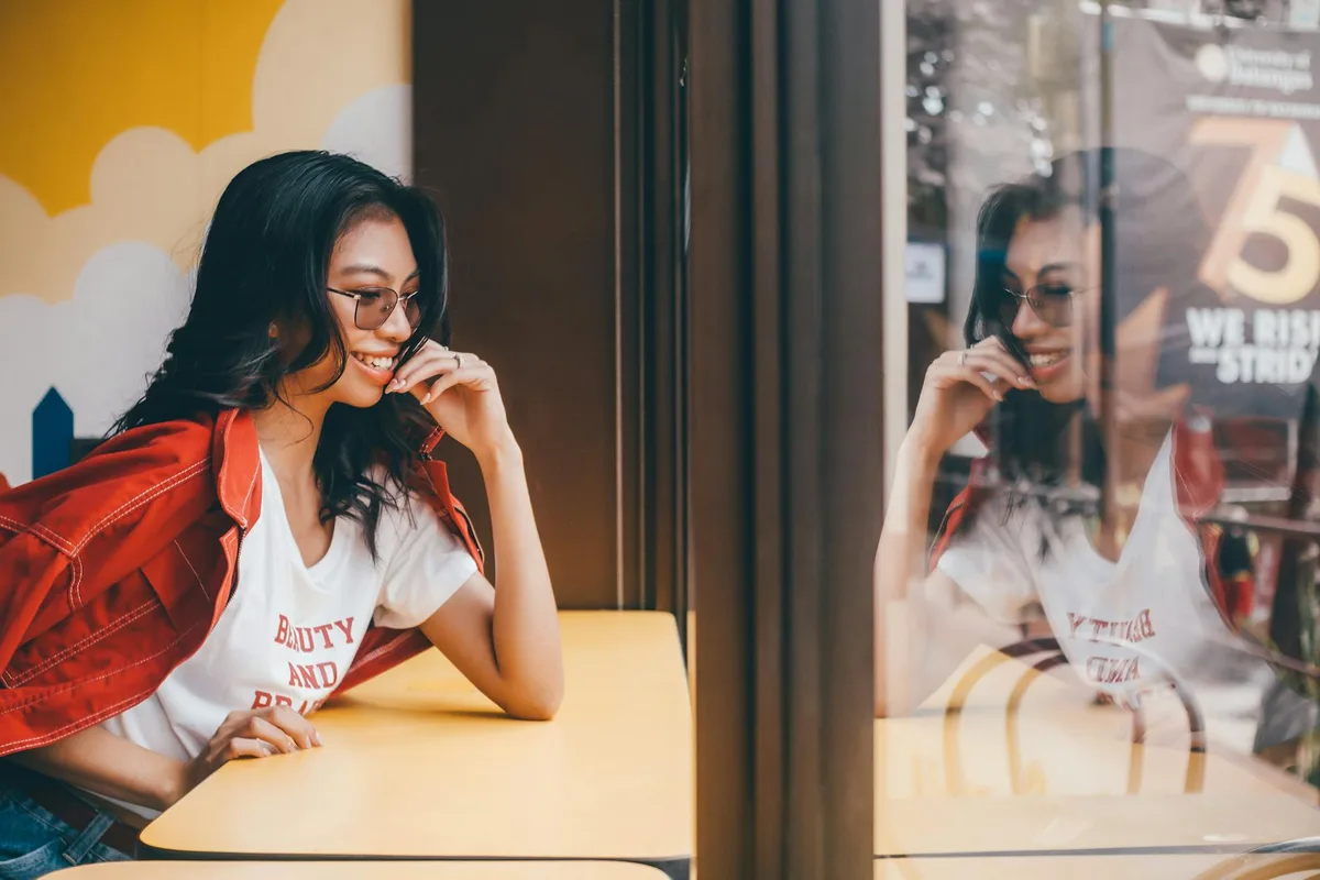Side-by-side verdict table showing Printicious recommended for Shopee sellers and Printful for own-website sellers